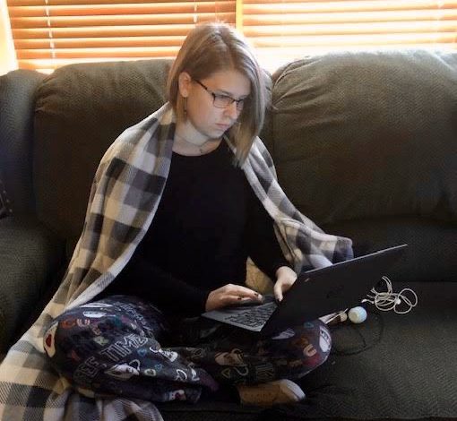 Day 2: Pajama Day - Jailynn Hammel completing homework assignments in the comfort of her pajamas. 