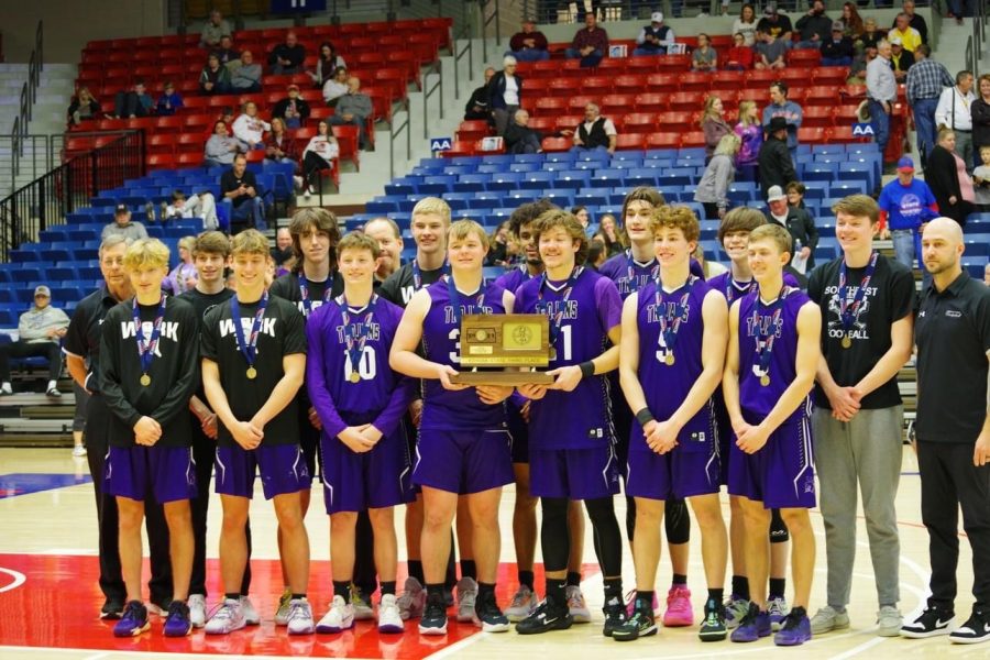 The SES Trojans pose for a picture after taking third at state. 